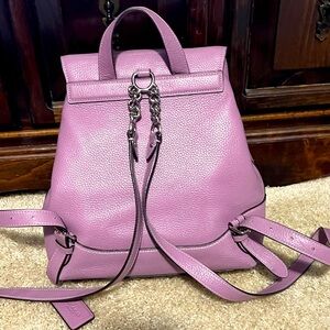 Lavender colored coach backpack; in almost new condition